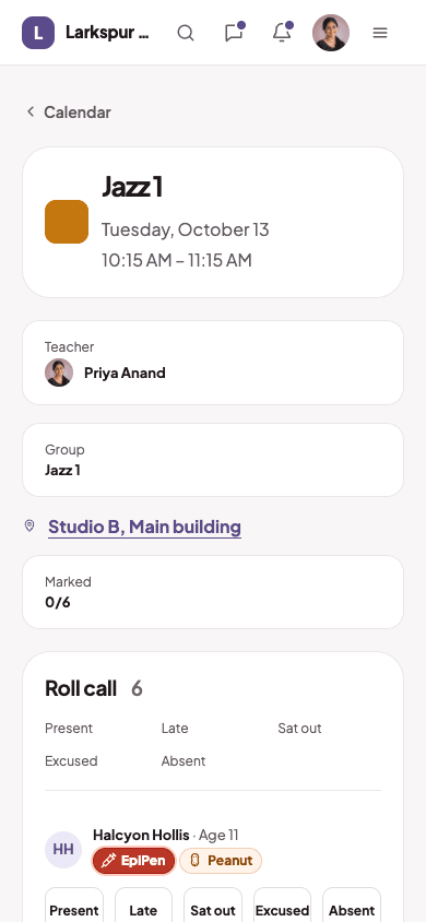 A teacher taking roll call on a phone